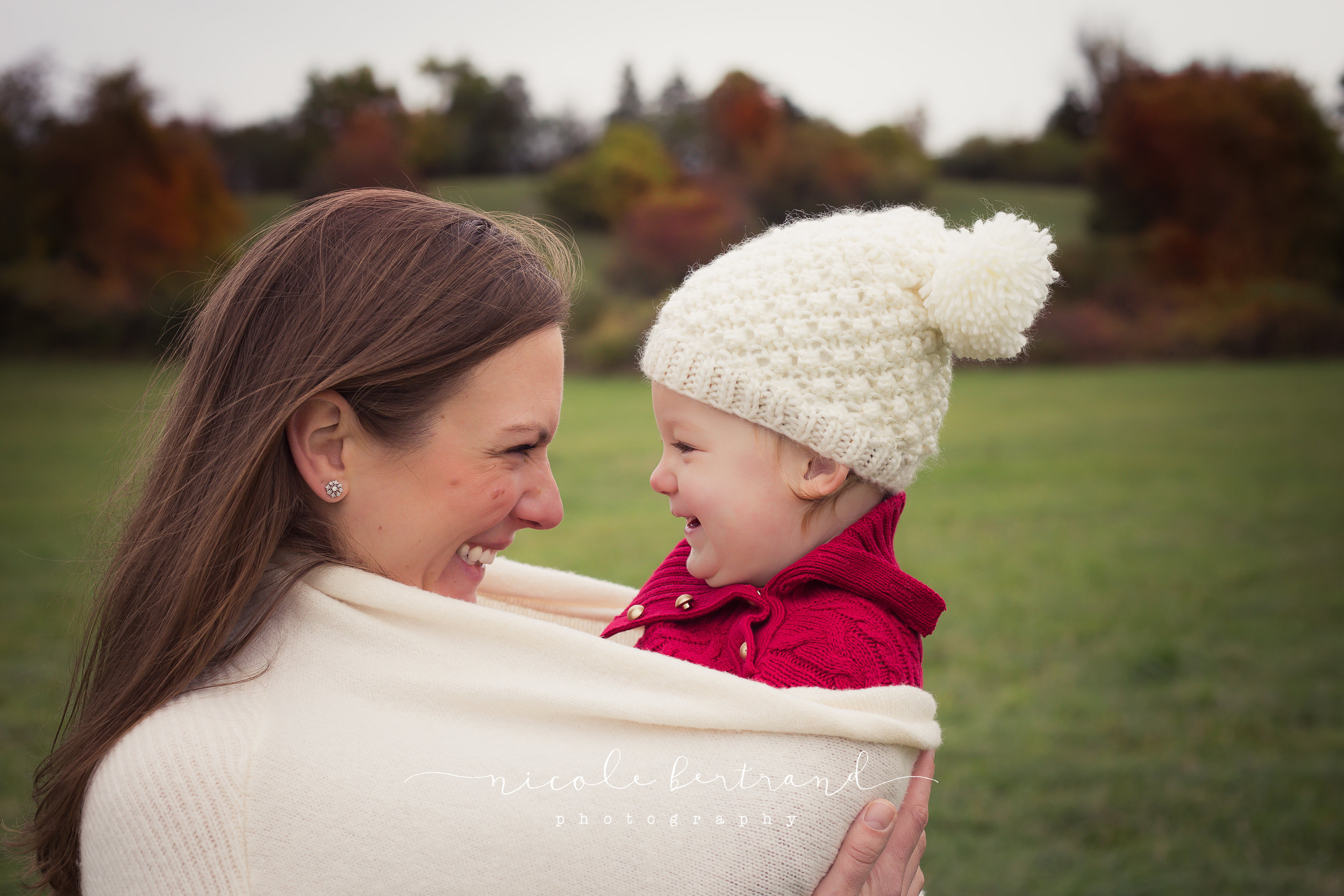 mom snuggling with baby during lifestyle newborn session