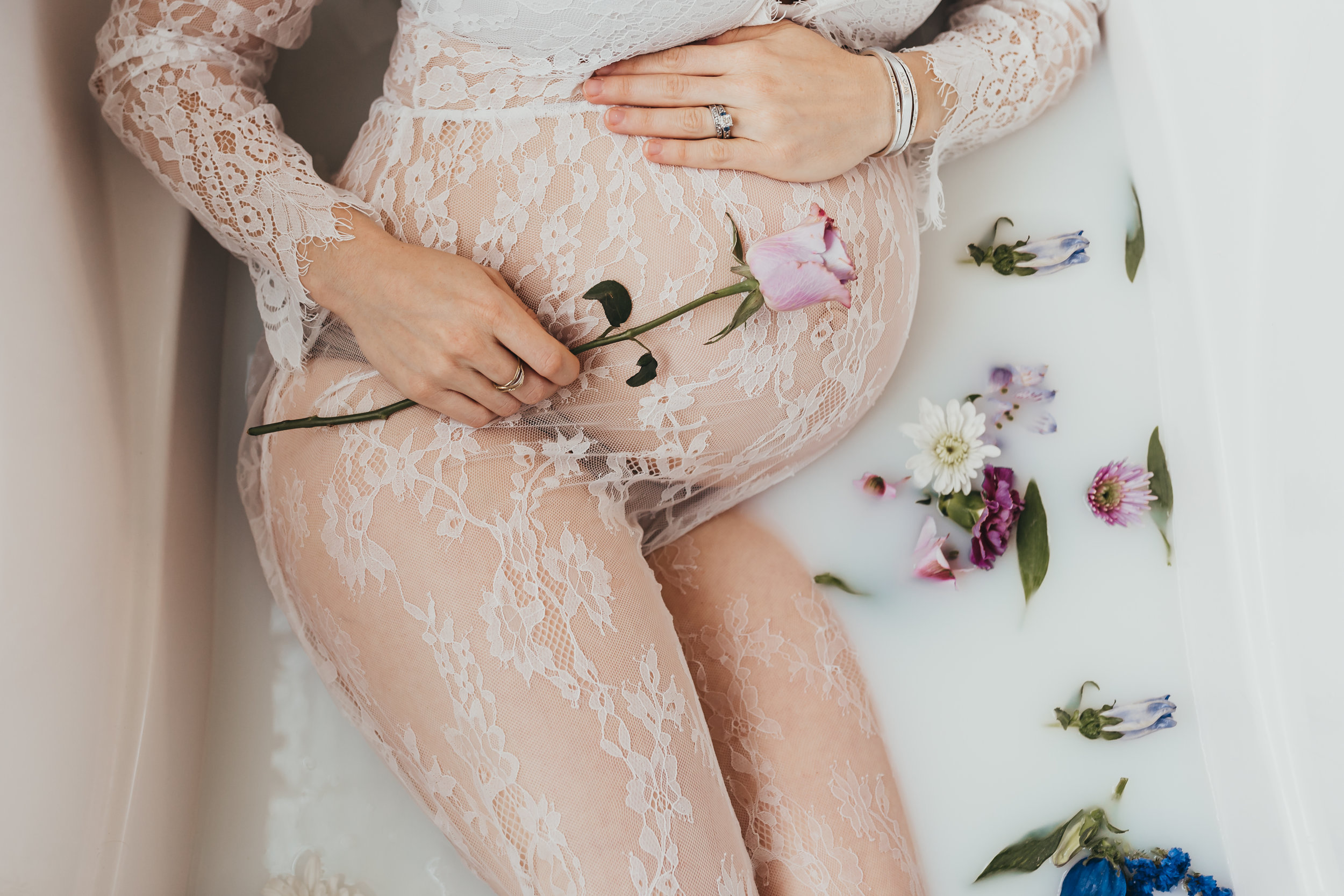 maternity lace milk bath holding flower