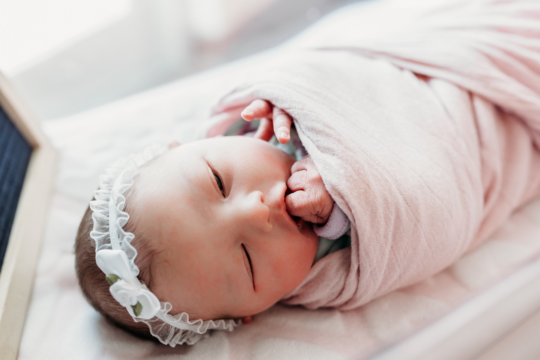 newborn girl in bassinet during fresh 48