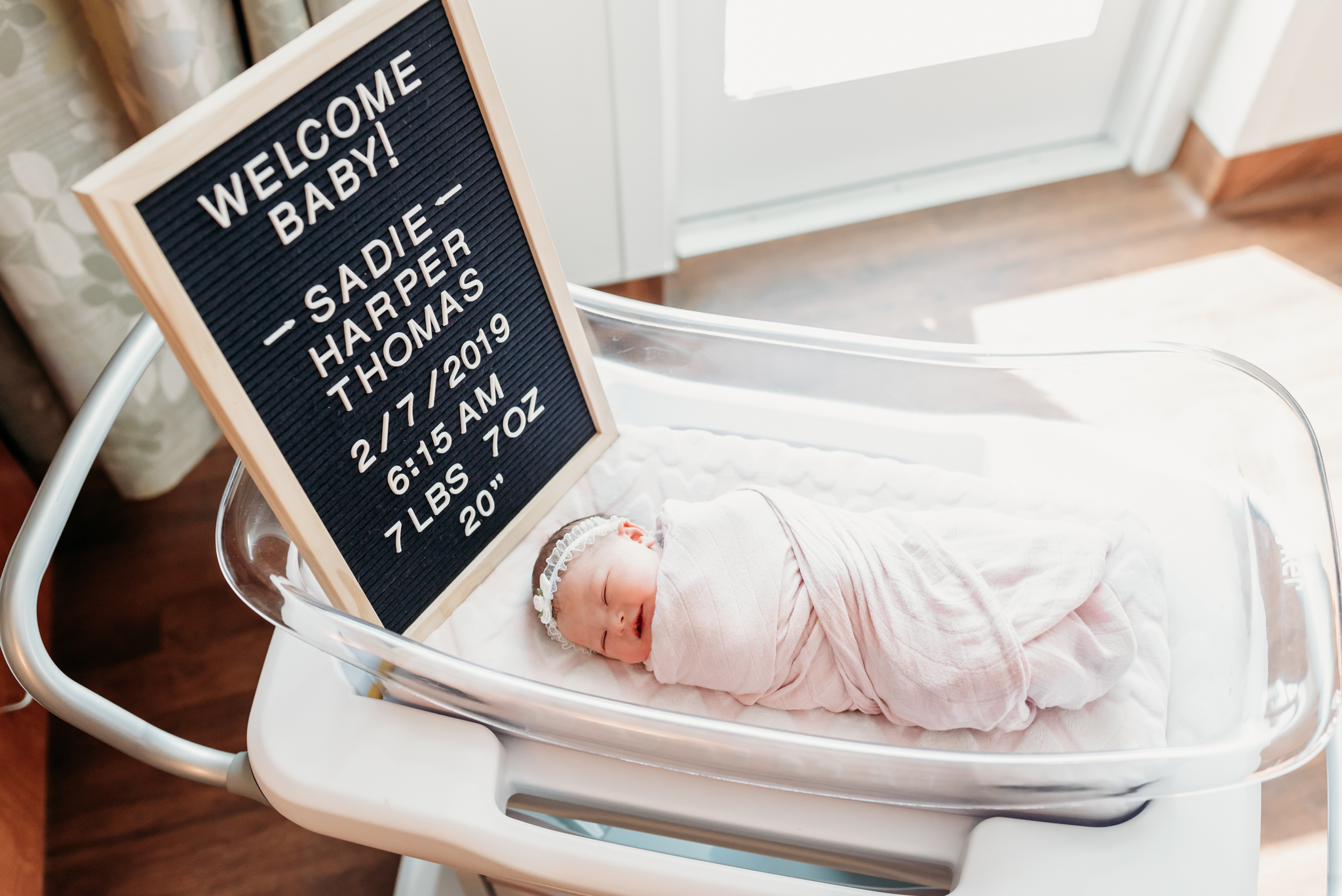 baby in bassinet with letter board fresh 48