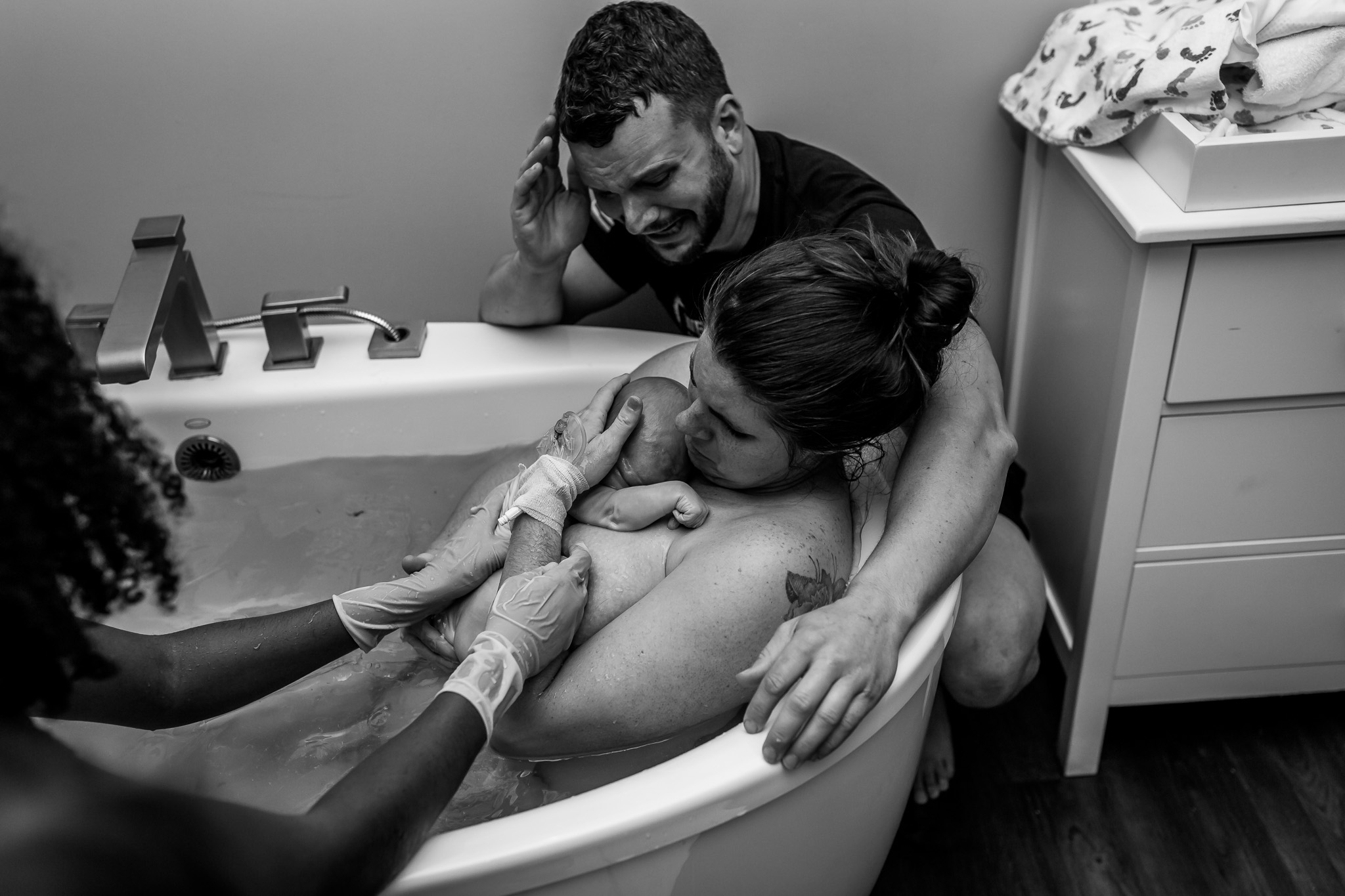 dad cries after seeing son born during water birth