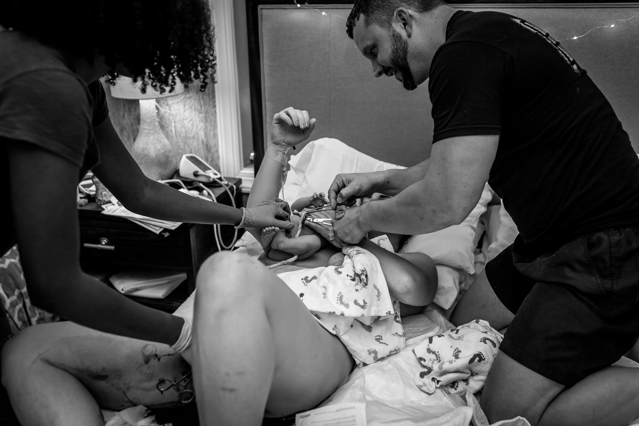 Dad cuts umbilical cord birth center