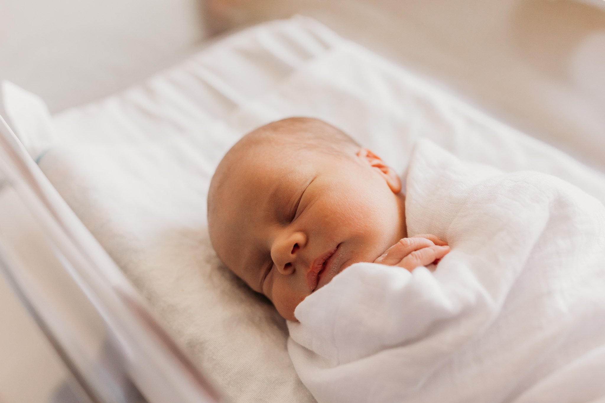 newborn in bassinet during fresh 48 hospital session