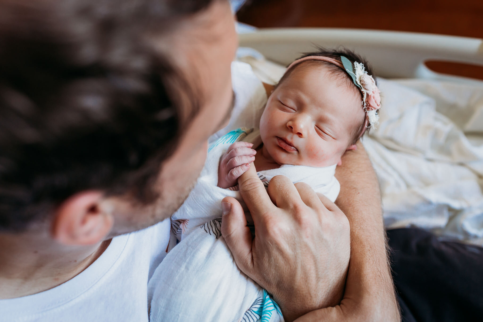 newborn girl holding dads fingers fresh 48