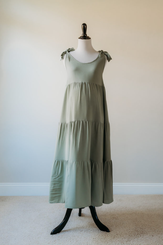 Sage green tiered midi maternity dress with tie straps