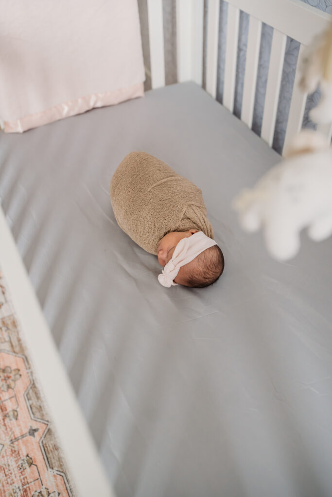 newborn baby session in crib